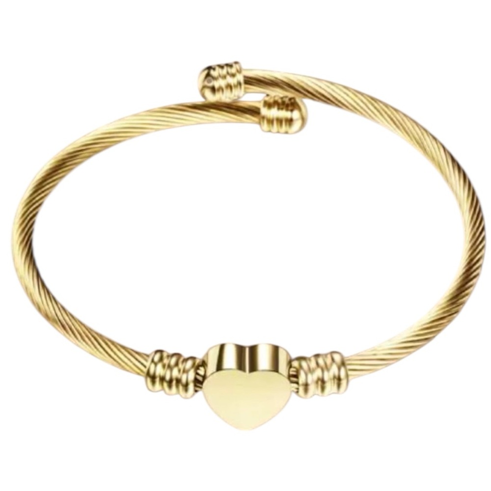 Woman’s stainless steel adjustable cuff bangle bracelet with heart charm. Gold